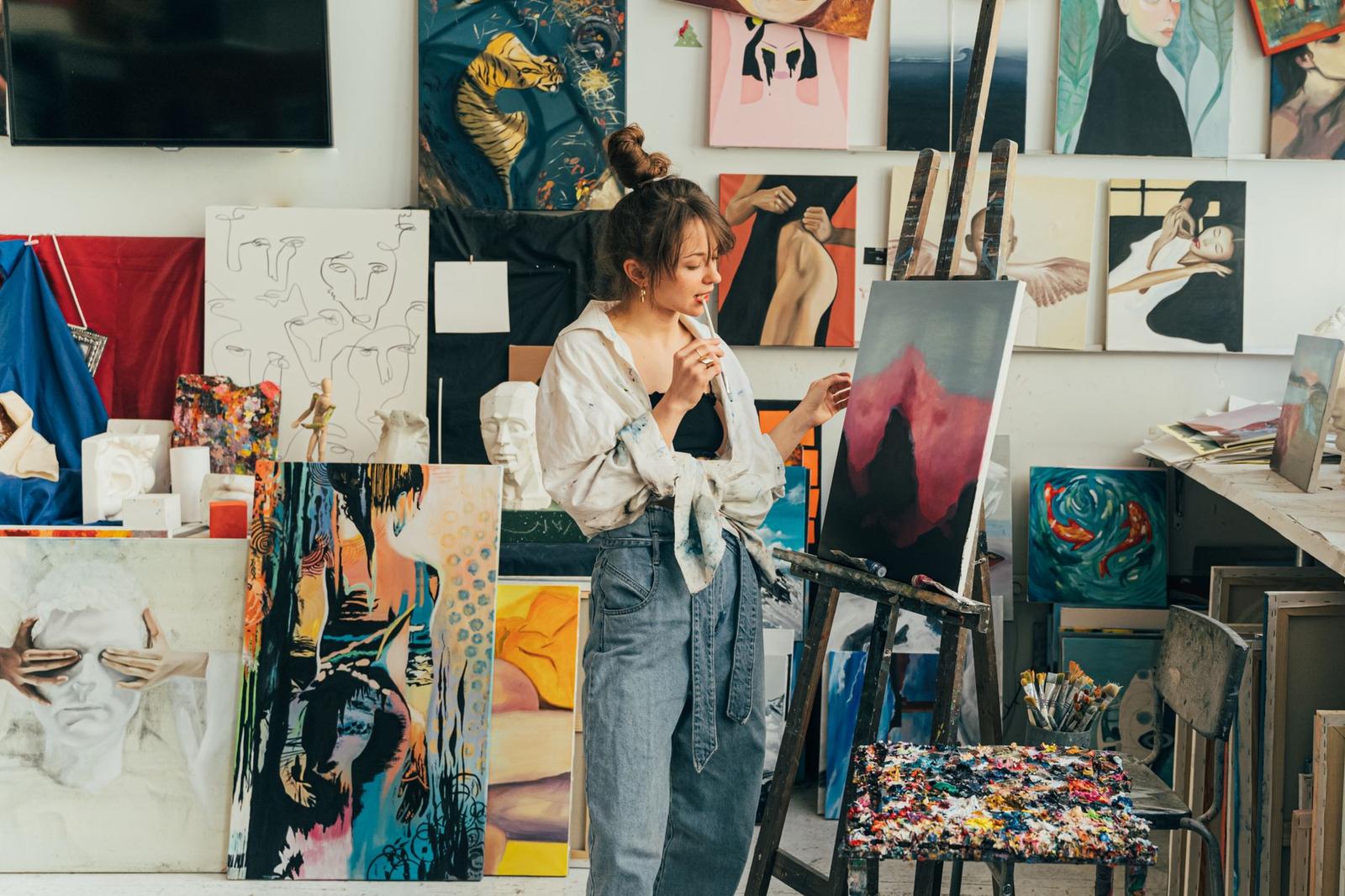 A Woman Painting on a Canvas