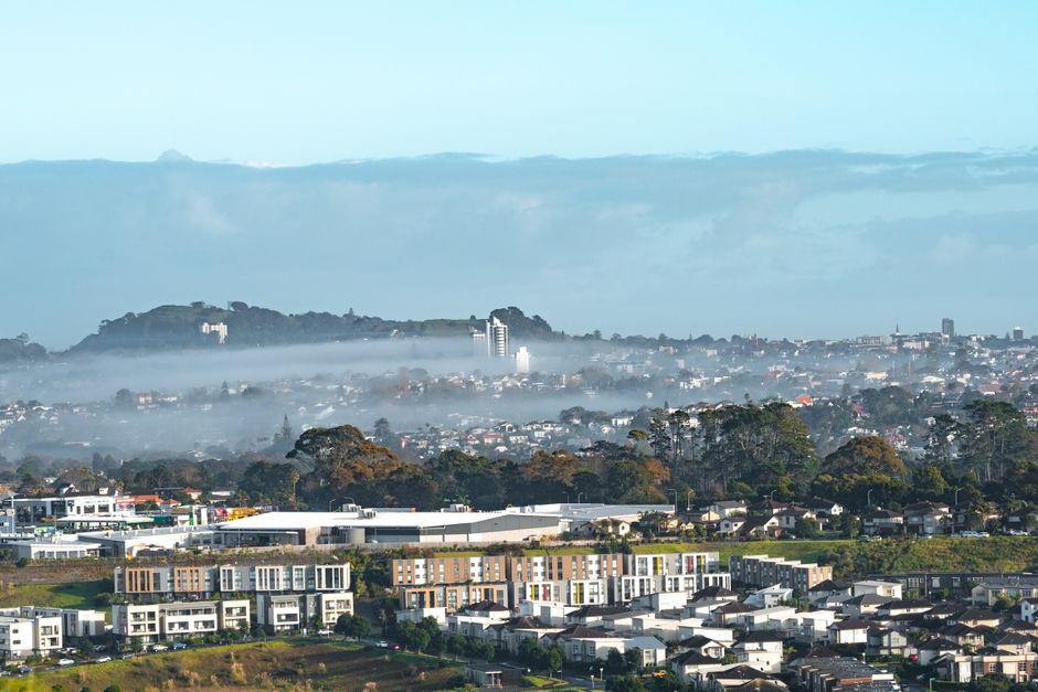 Scenic Auckland Suburb with Morning Fog