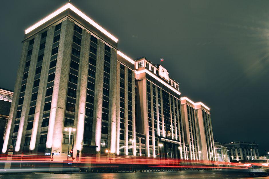 White and Brown Concrete Building during Nighttime