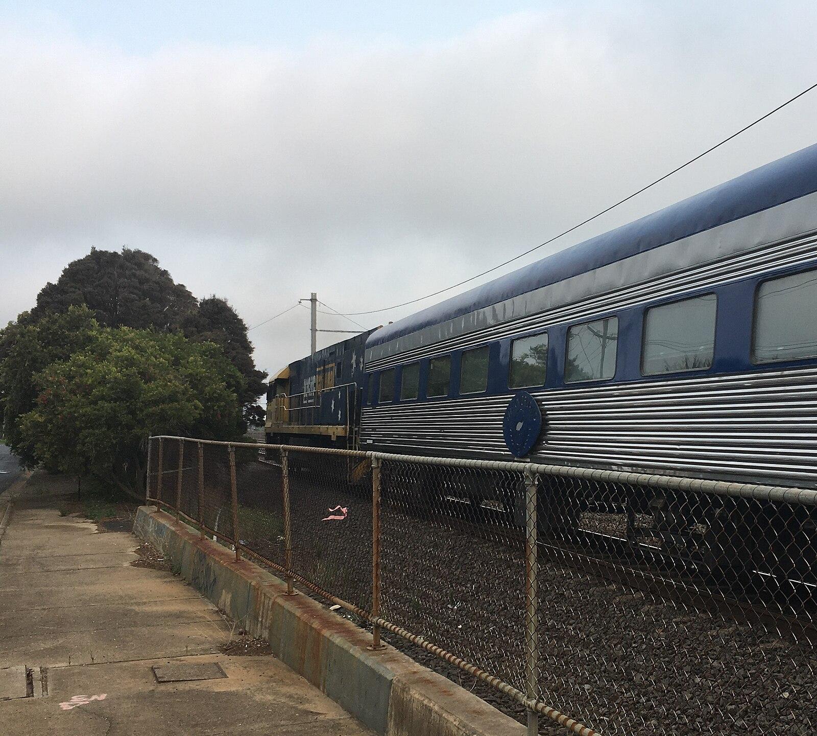 The Overland passing abandoned Paisley Station, Altona North